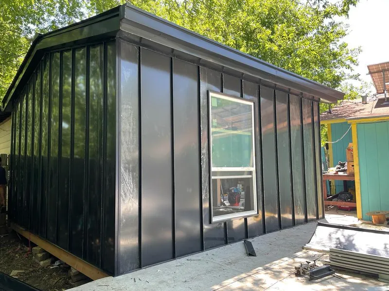 Black standing seam metal wall panels for Metal Roof Installation in De Pere